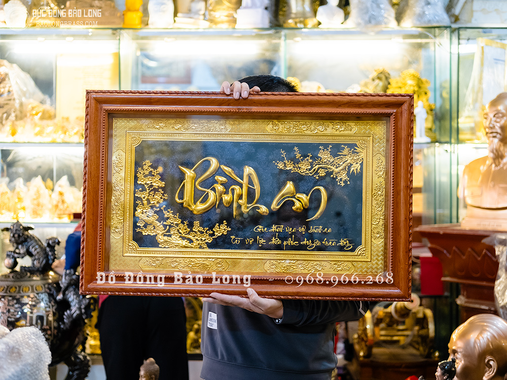 Tranh Đồng Chữ Bình An Thư Pháp Dát Vàng Khung Gỗ Gõ Đỏ 50cm x 80cm