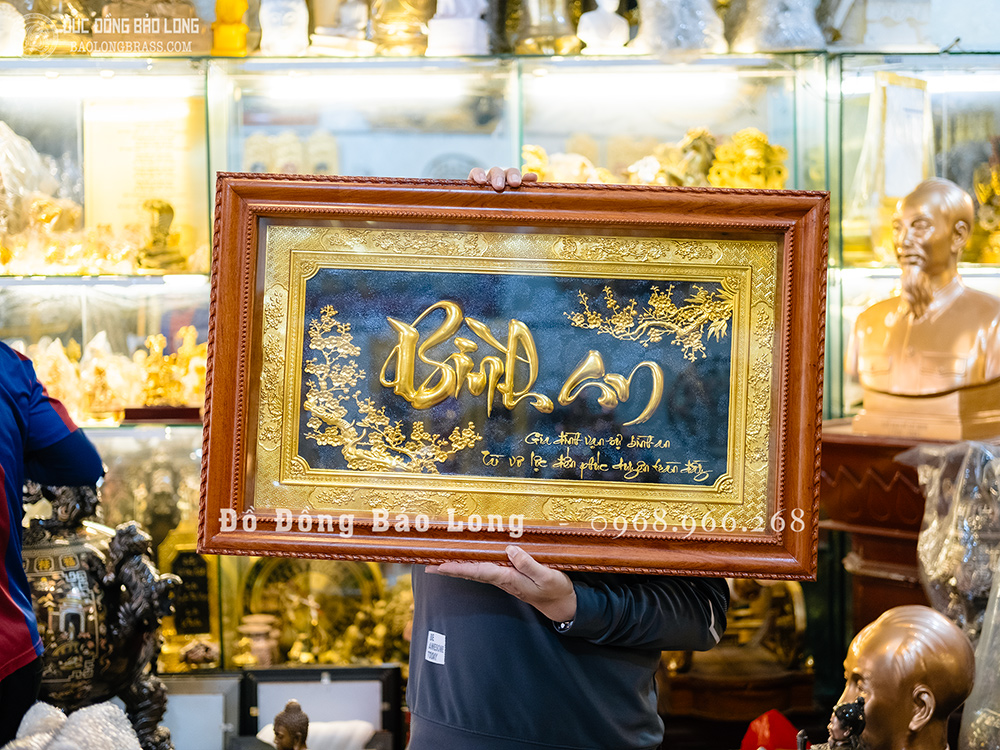 Tranh Đồng Chữ Bình An Thư Pháp Dát Vàng Khung Gỗ Gõ Đỏ 50cm x 80cm